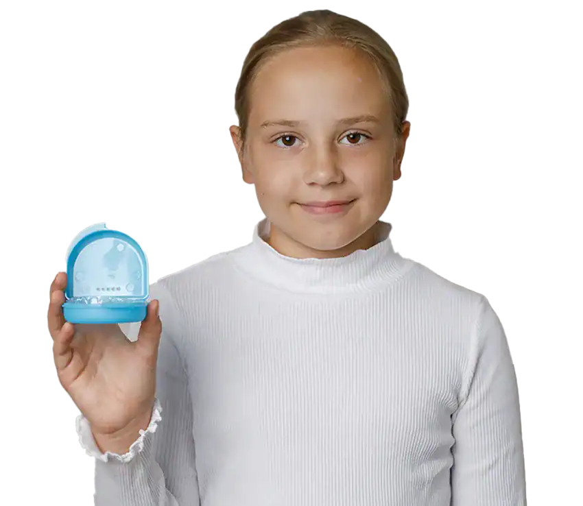 A child holding an Invisalign aligner case at Smile Spa Camarillo Dentistry