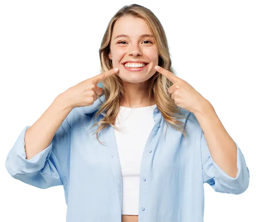 A teenager holding an Invisalign aligner at Smile Spa Camarillo Dentistry
